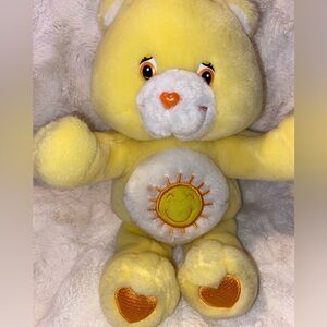 Care Bears kissing Sunshine Care Bear